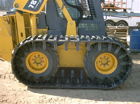 what is better tracks or tires on a skid steer|aggressive skid steer tracks.